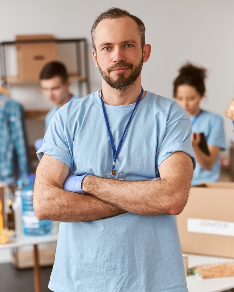confident-caucasian-male-volunteer-in-blue-uniform-3XBYLR5.jpg